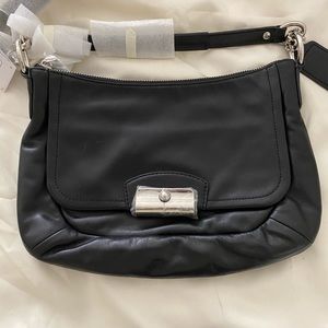 Brand New small black leather Coach bag.
